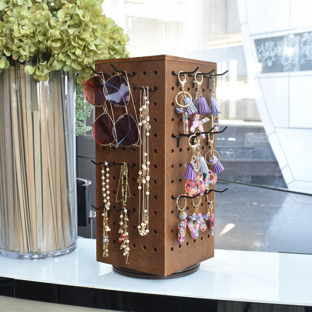 MOOCA Wooden Rotating Four-Sided Pegboard Jewelry Accessories Rack, Rotating Jewelry Display with a Lid for Large Inner Storage Space, 48 Removable Black Hooks, Brown Color