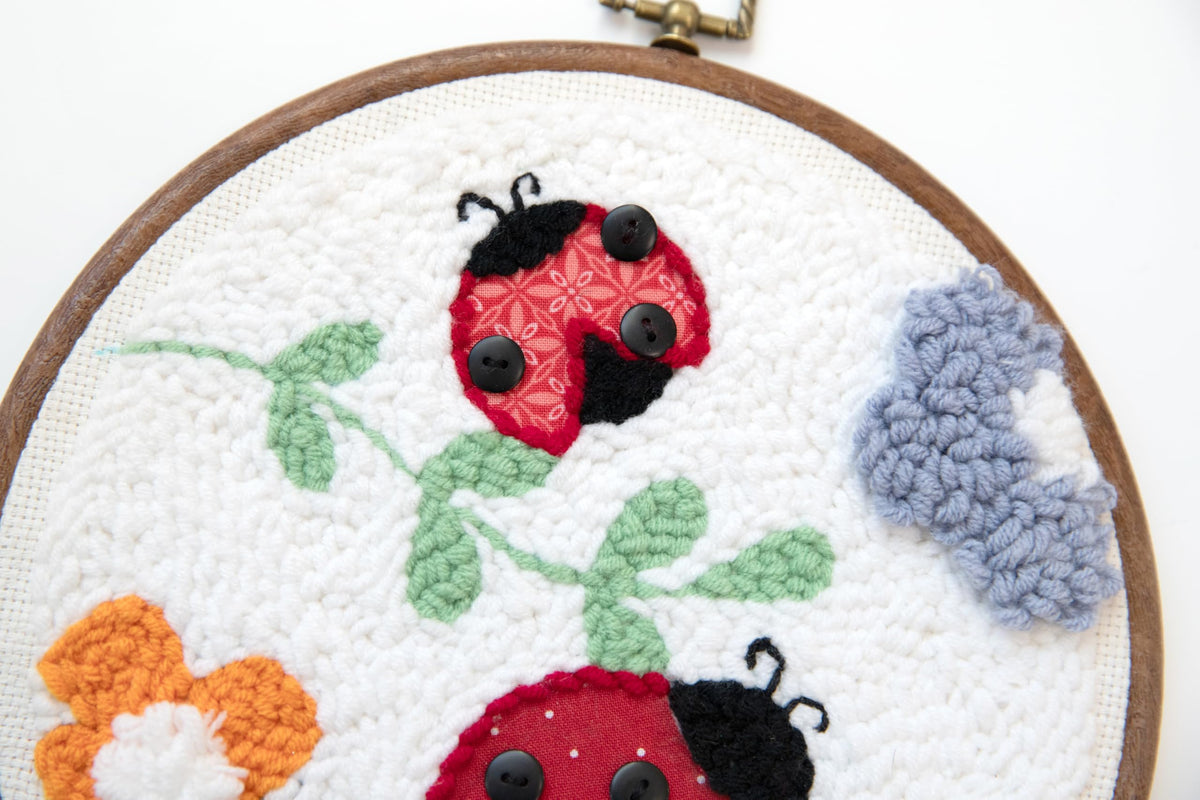 Kimberbell Punch Needle Kit – Bugs & Blooms - Complete DIY Embroidery Kit with Tool, Monks Cloth, Yarn, Appliqué Fabric & Frame – Ladybug & Floral Punch Needle Design for Handmade Gifts & Décor