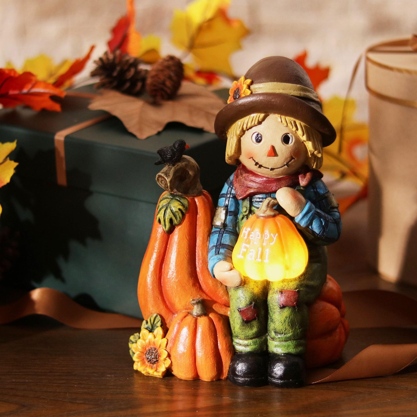 TERESA'S COLLECTIONS Fall Decor, Scarecrow Decor, Autumn Scarecrow Holding Pumpkin with Solar Lights, Waterproof Resin Outdoor Fall Decor, Fall Gifts Outdoor/Indoor,6.3"